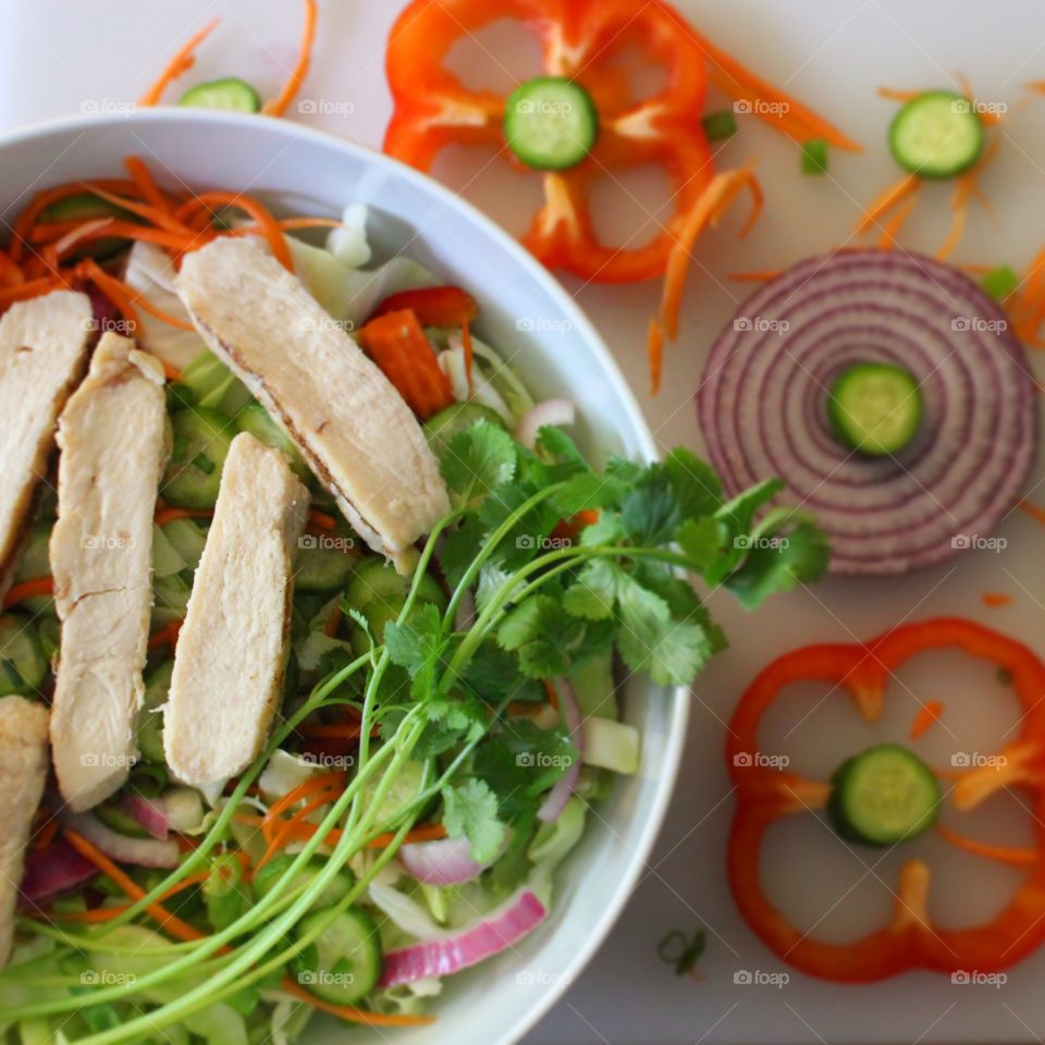 "Goi ga" is Vietnamese chicken salad. What differentiates it from other chicken salads are fragrant herbs and "nuoc mam" dressing, which is fish sauce mixed with garlic, sugar, lime juice, and chili peppers. 