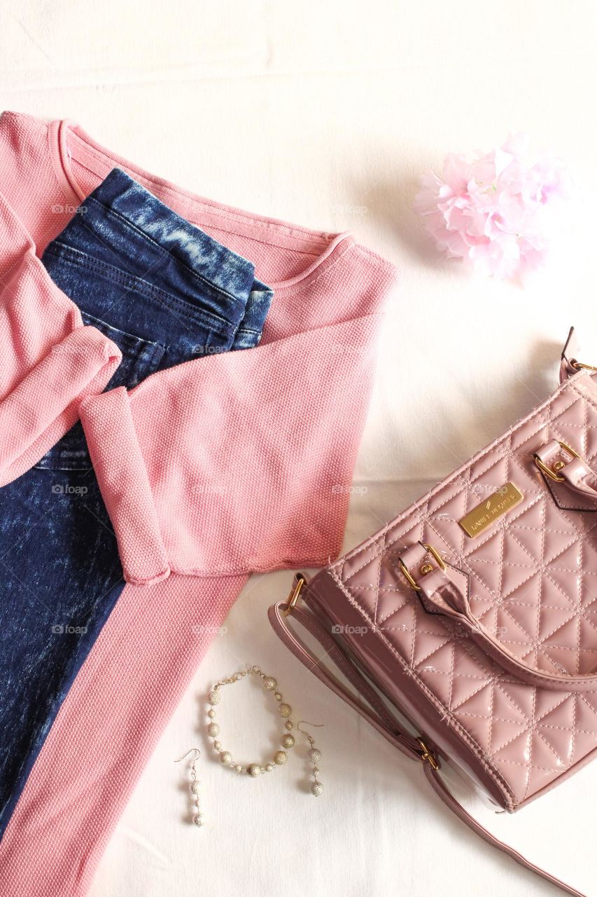 Pink clothing and accessories flatlay