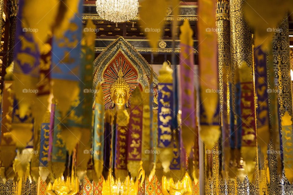 Buddha surrounded by color