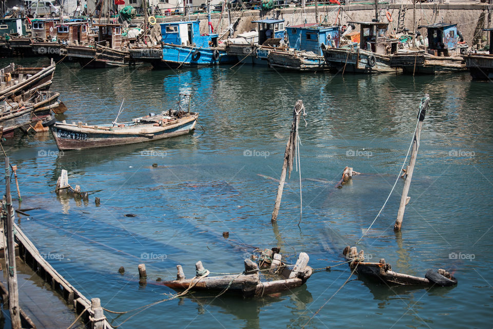 Asia China Qingdao home of Tsingtao Beer,old german colonies old fisher habor fishing boat wreck