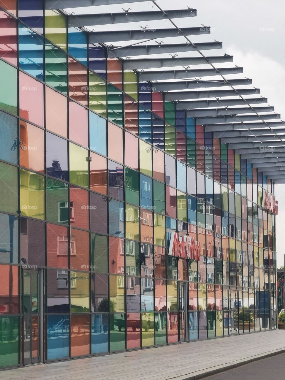 The facade of the appliance store in rainbow colours