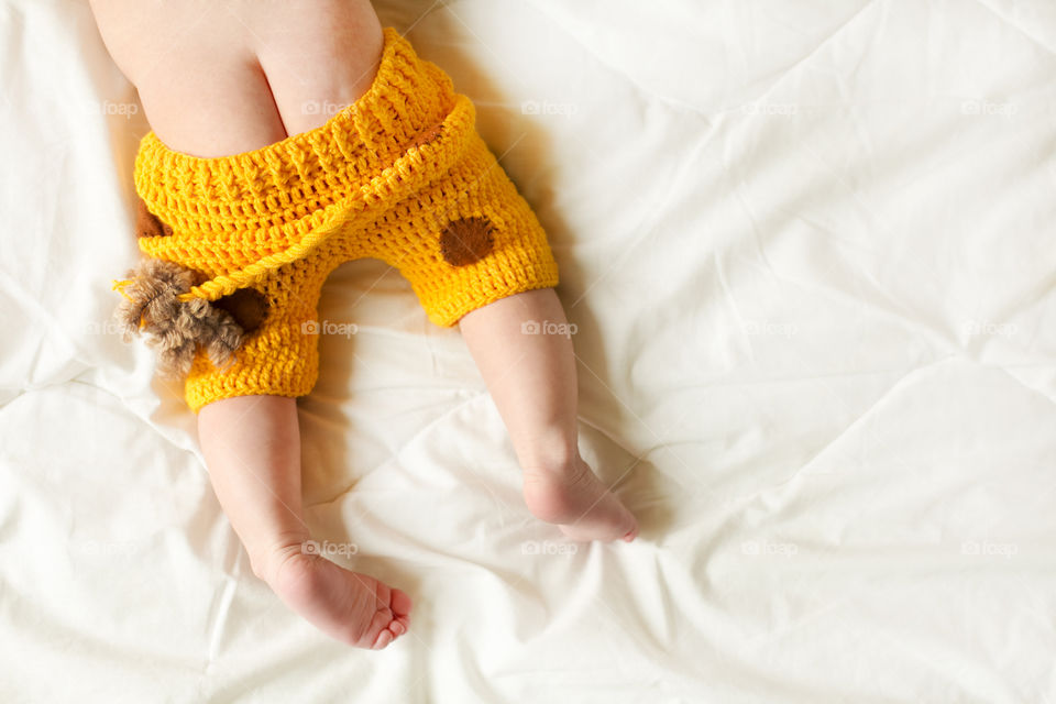 High angle view of baby feet