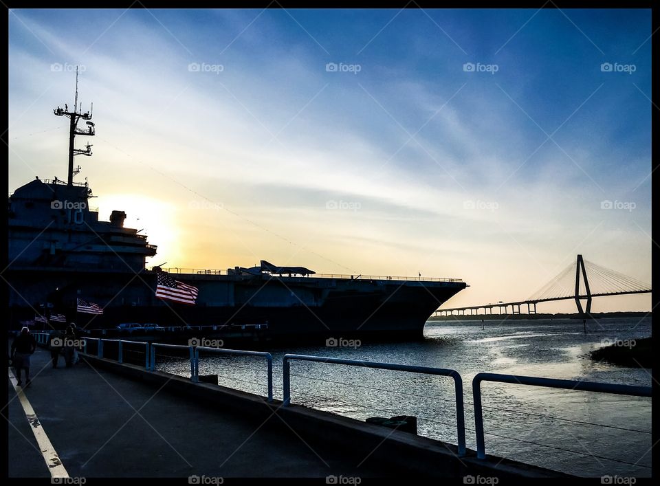 Sun setting behind the USS Yorktown