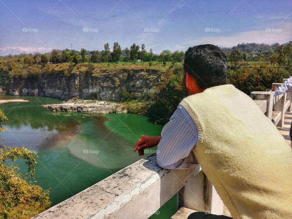 A man enjoying beautiful scenery of Nature and feel relaxed mood.