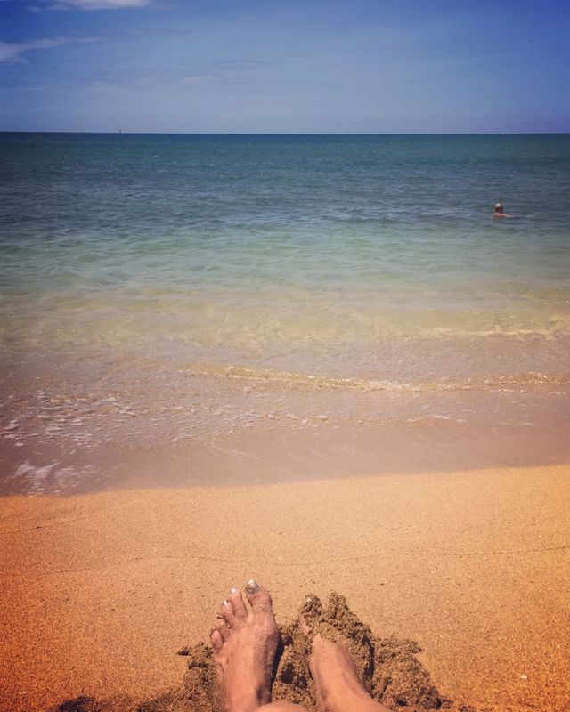 Feet in the sand