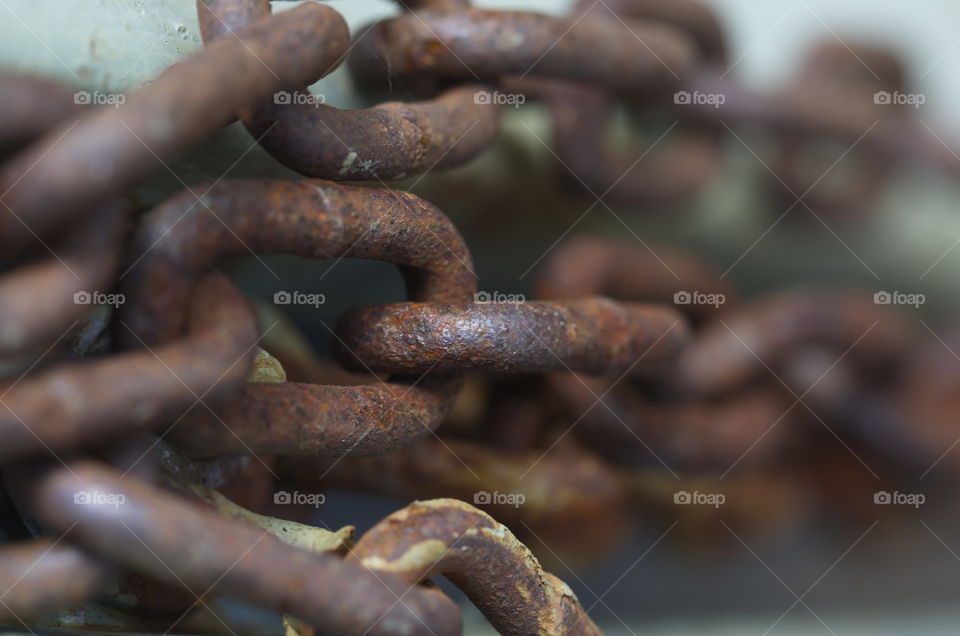 Rusty chain links close up