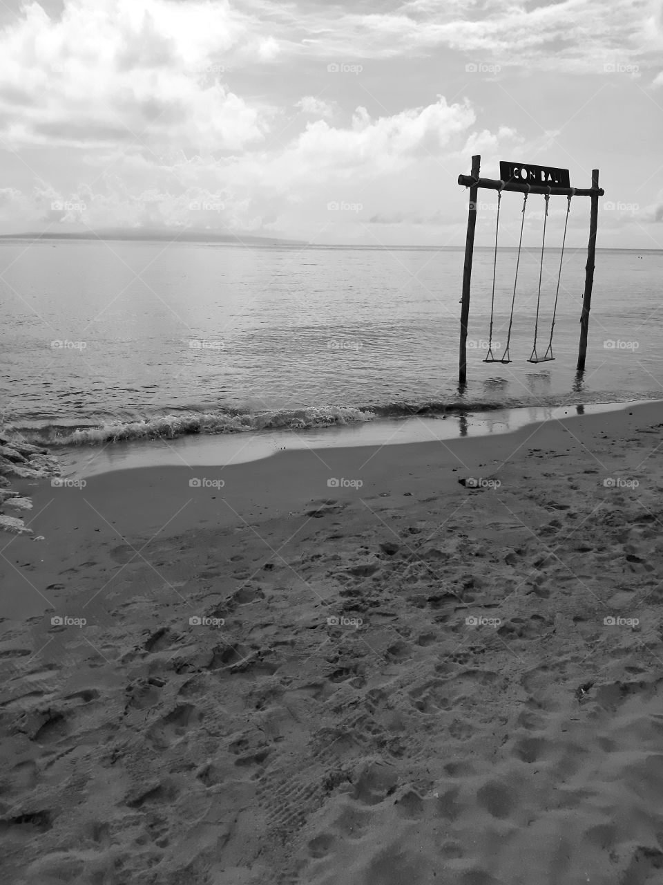 monochrome style of the swinging on the beach