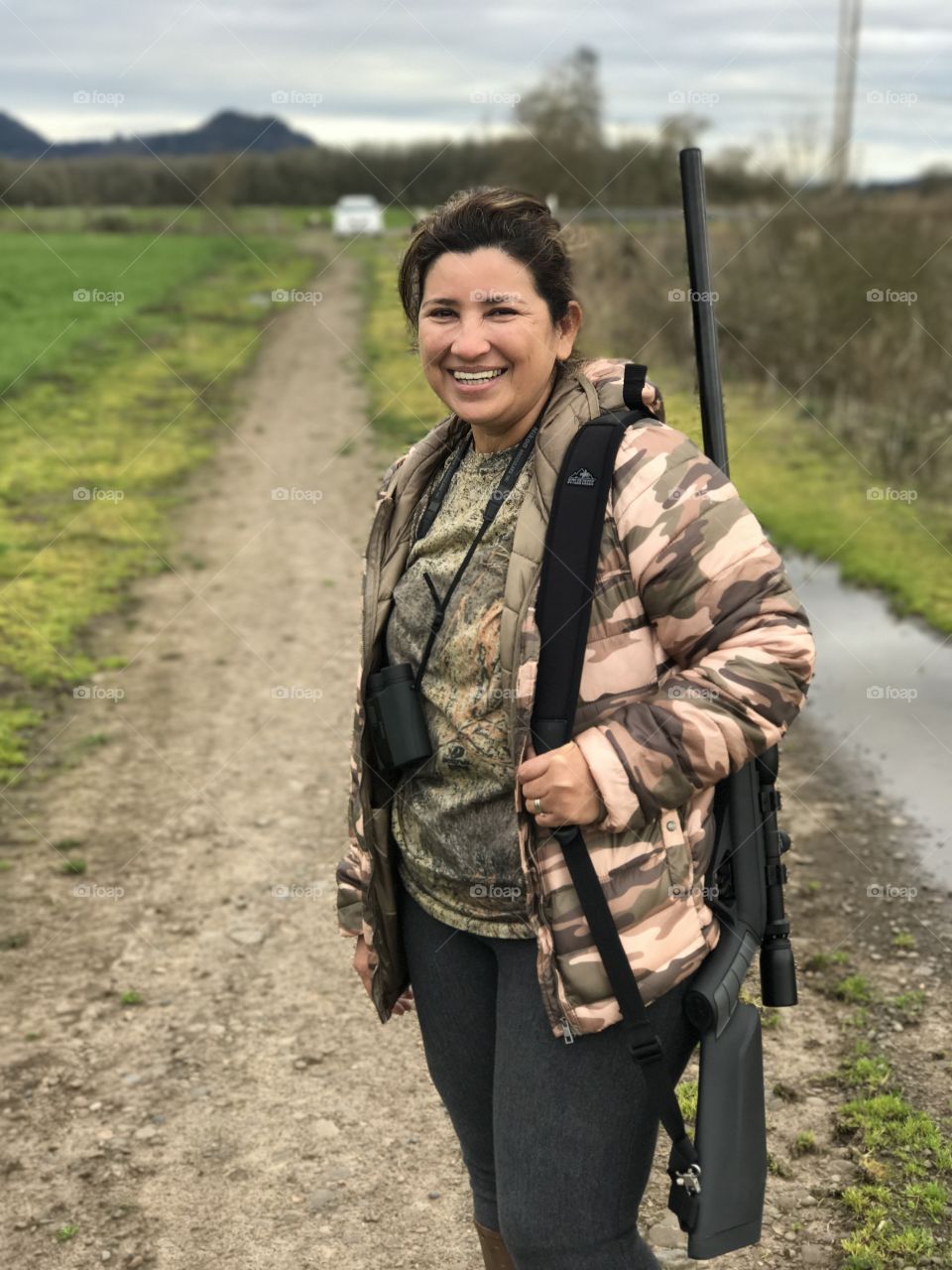 A woman enjoying the outdoors. Nothing quite like an evening hunt to clear and focus the mind. 