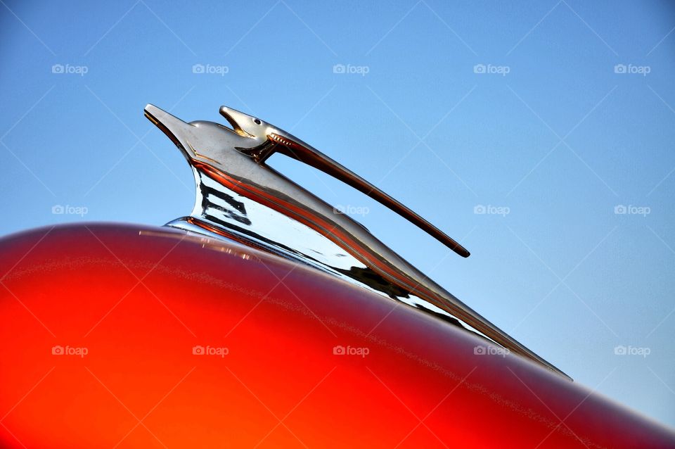 Classic car hood ornament. 