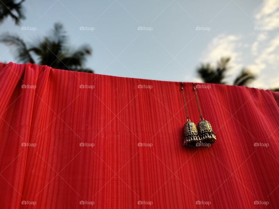 Defining the capacity of ear..these are pair of beautiful silver earring..