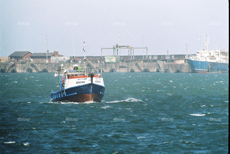 Boat in harbor.