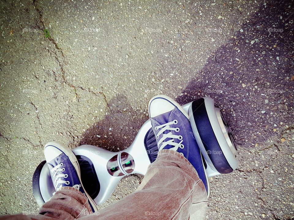 feet on hoverboard