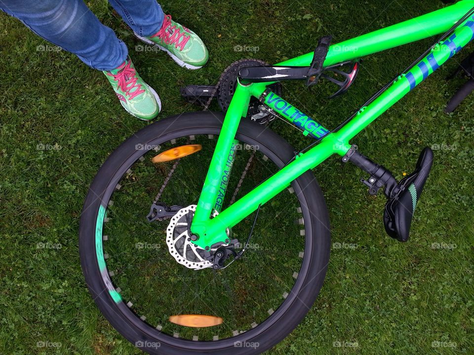 Photo taken with my jogging shoes and my sons bike. Both have a lovely green color.