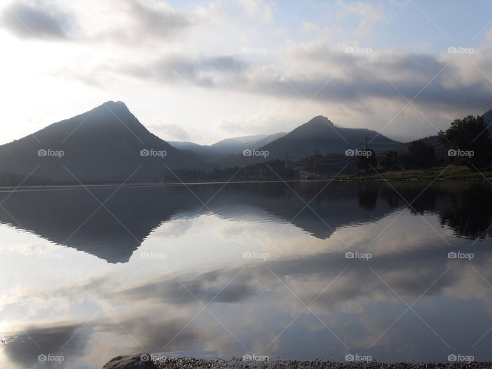lake reflection mountains rocky by mcannon