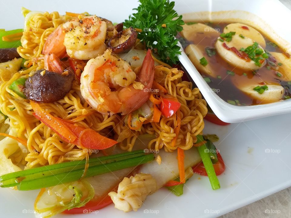 Wok fired noodles and caramelized tofu.