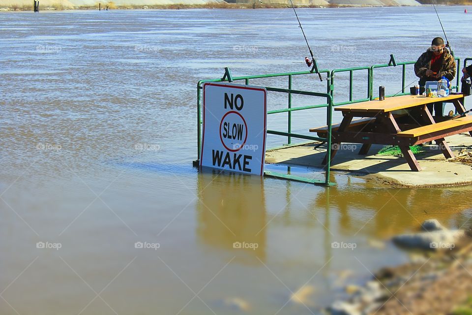 river flood on a fishing day