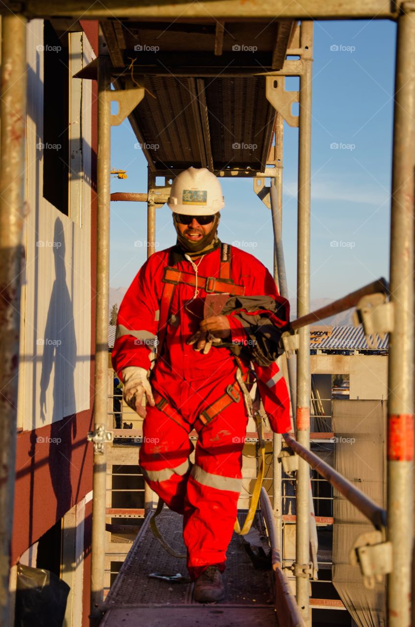 laborer on the scaffolding