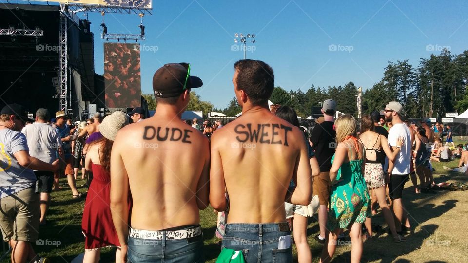Dude Sweet!. Couple fun guys at a concert. Definitely know how to attract attention.