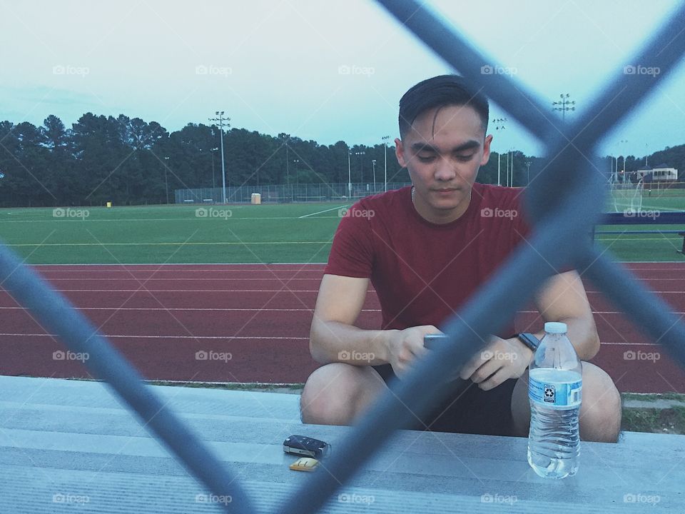 When taking a candid photo of him. Looking good while sweating after running. 