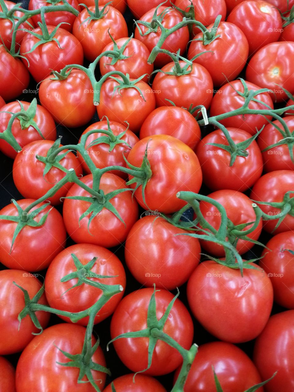 background of ripe tomatoes