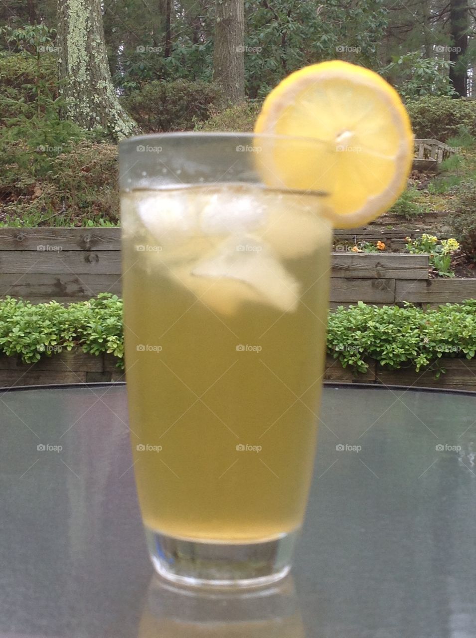 Enjoying a glass of green tea iced tea on a Spring day.