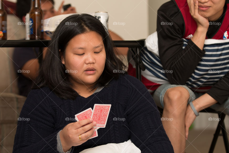 Girl playing card