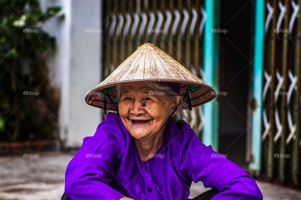 Old woman looks very happy 