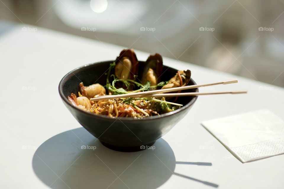 close-up of a plate with Asian cuisine