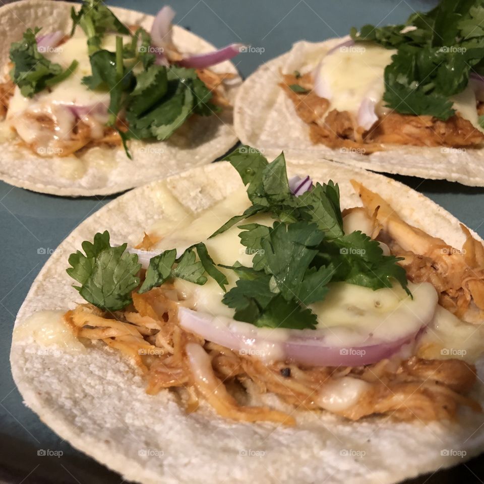 Chicken tostadas topped with cilantro