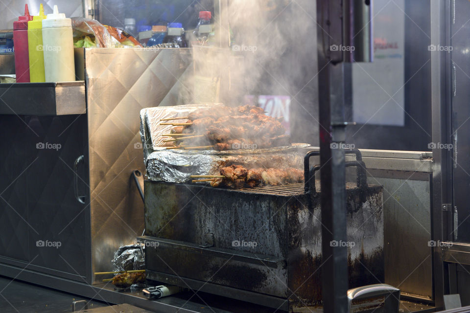 A food cart on a street corner in New York City