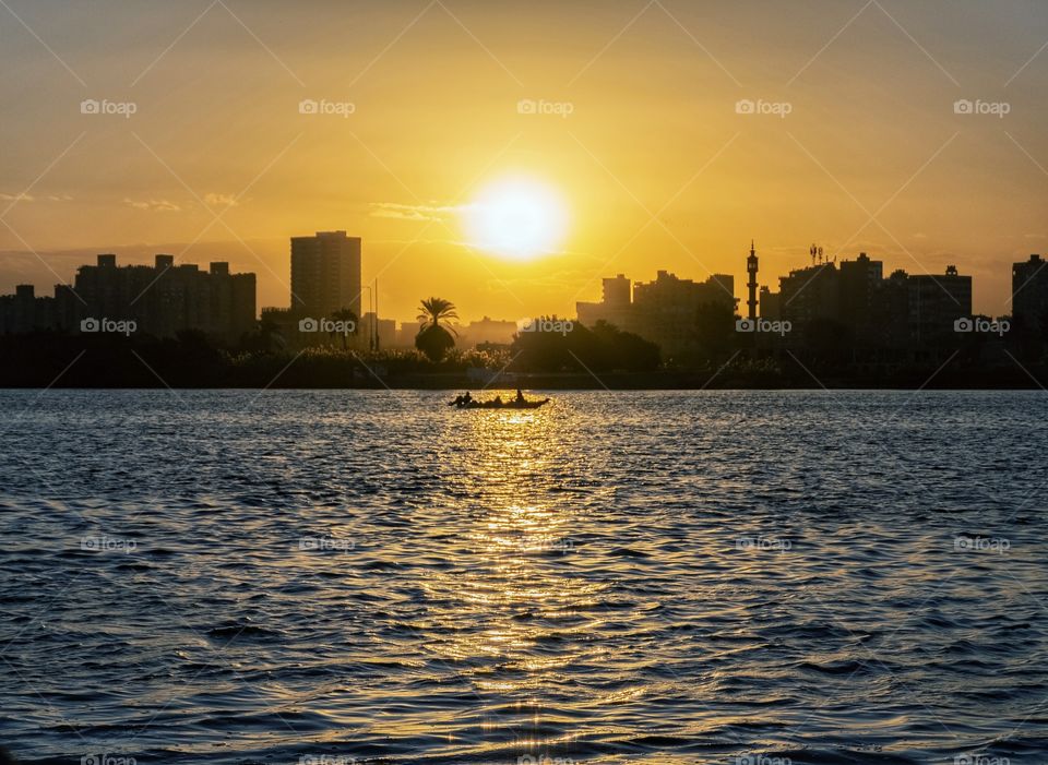 Sun light shade over ship and reflect on Nile river in Kairo Egypt