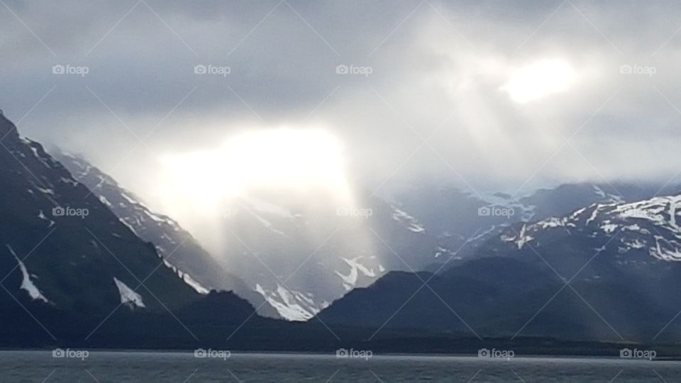 sun through the clouds in Alaska
