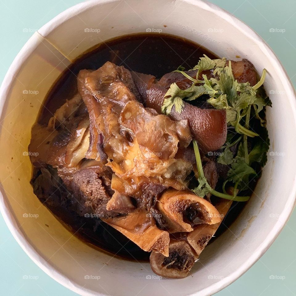 Teo chew bak kut Teh with fried chicken garlic, French beans with hae bee hiam, pig trotters and intestines meal