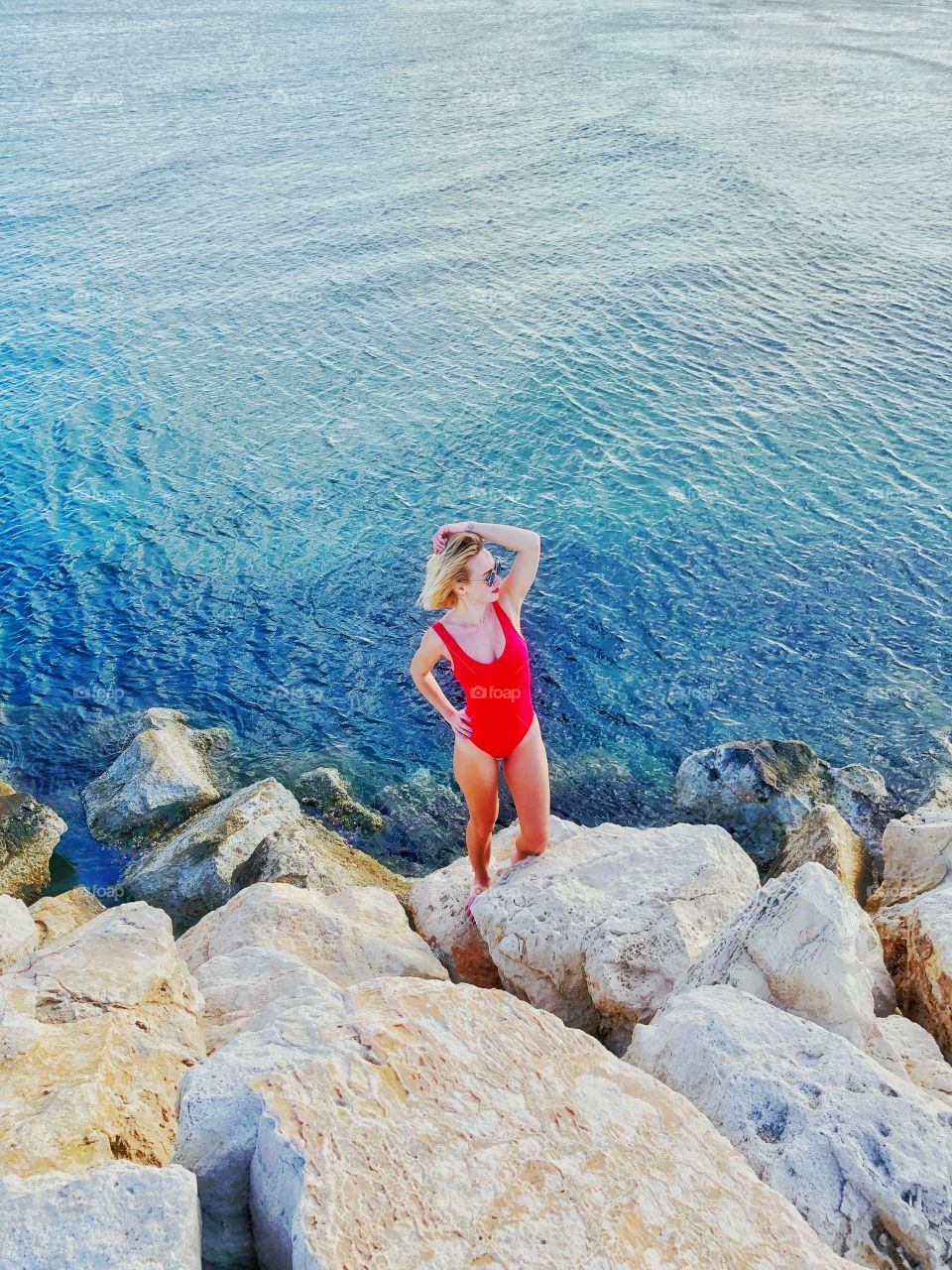 a girl in a red swimsuit