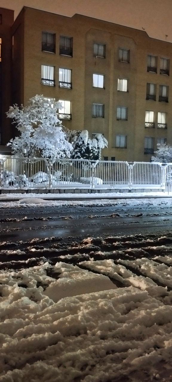 Light of the apartments at night is twinkling to me.They have their own situation inside,but in this beautiful snowy night after a long wait which ground has covered its white skirt,I am sure, residents of these houses spending night in a happy mood.