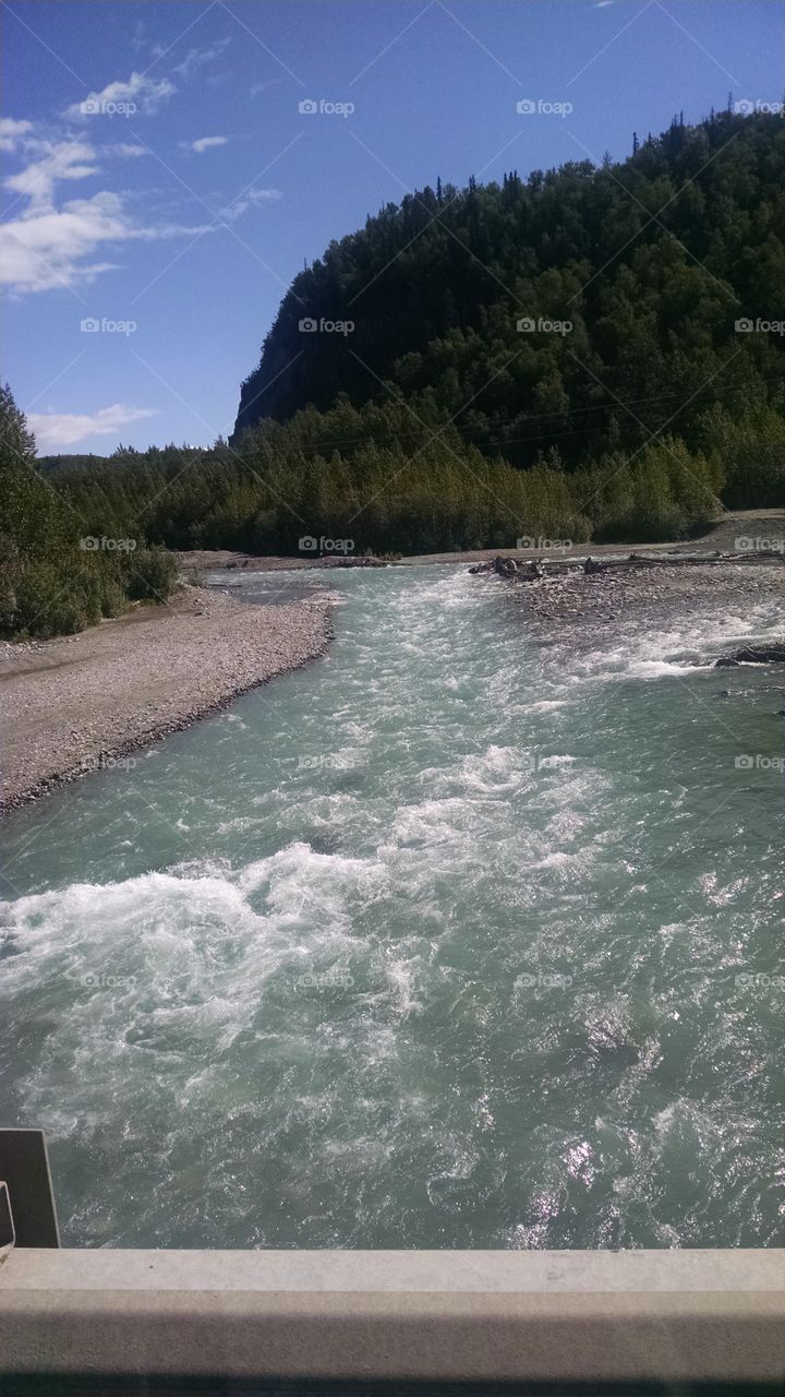 Glacial river flows Azure