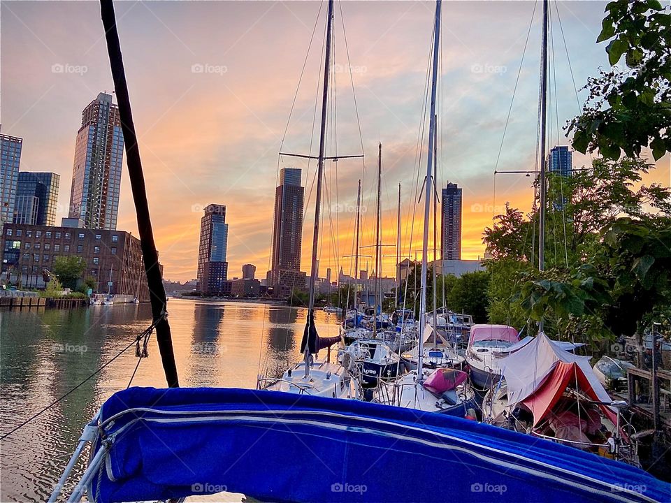 Another view of the “harbor area” of the “East River” a”Newtown Creek” by the “Pulaski Bridge” in Long Island City, Queens, NY. Across the water “Greenpoint”, Bklyn can be seen. 2022. Hypnotic Productions