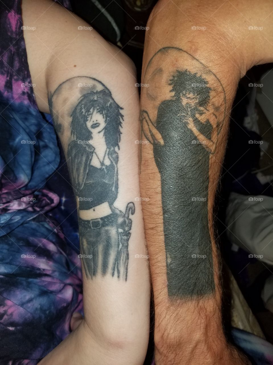 Death and Dream (Sandman) from the DC Vertigo comic series.  These are the matching tattoos my husband and I got in 2015.
