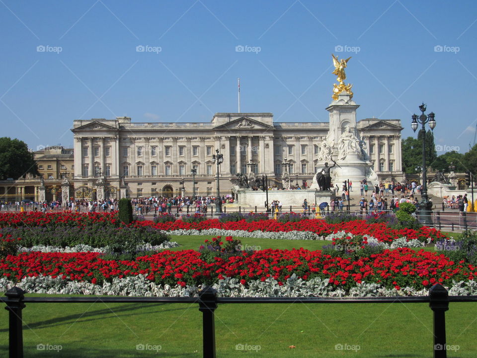 Buckingham Palace in London, England pictured with flowers.