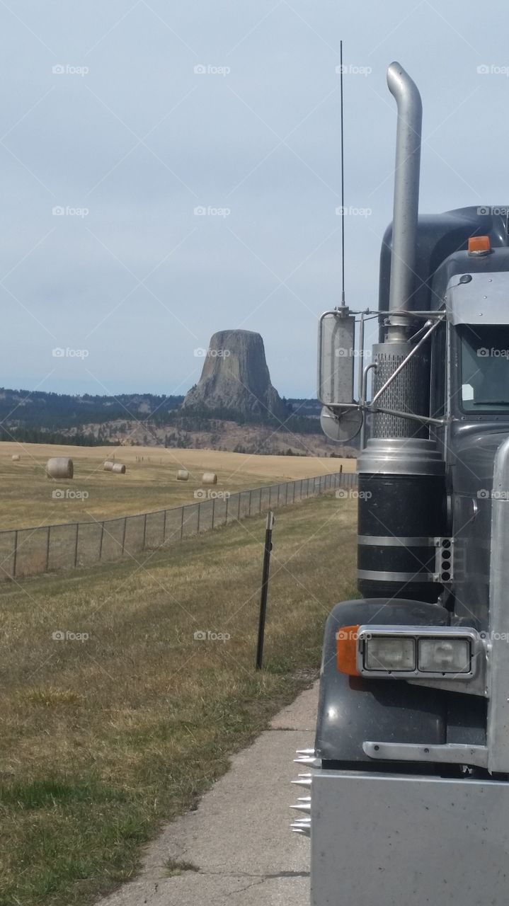 The Devils tower. There in the background is the Devils Tower out in wyoming, it's a pretty insane thing to see in person