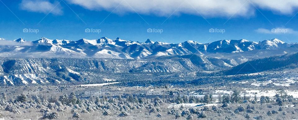 Panoramic view of mountains range in winter
