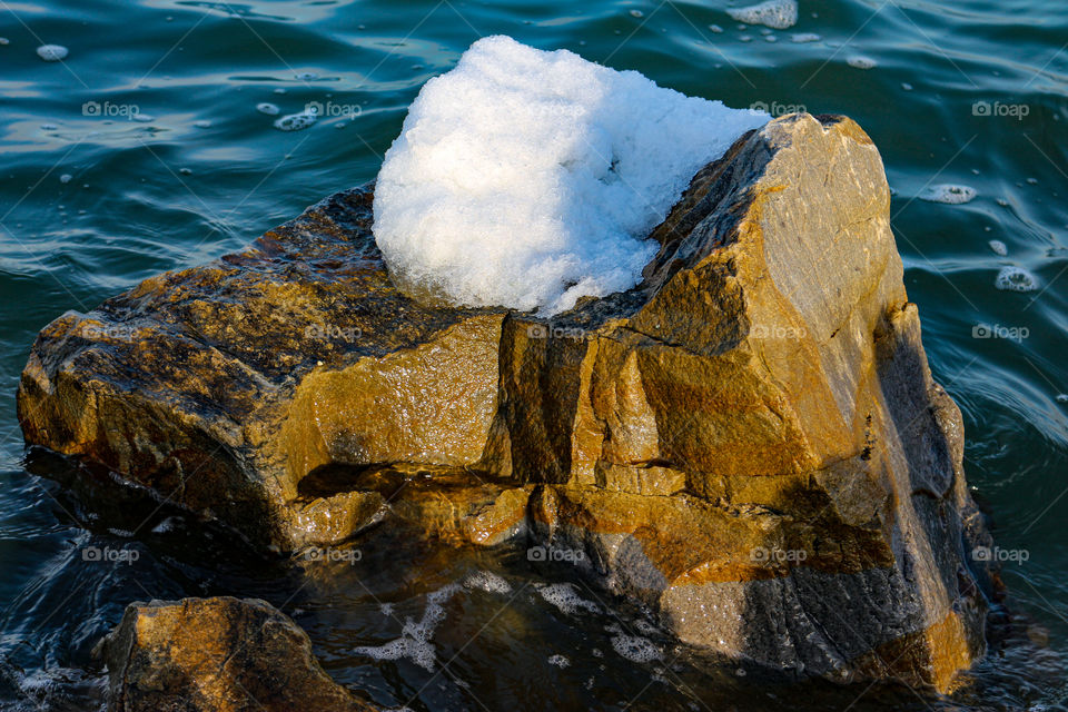 Snow on a rock
