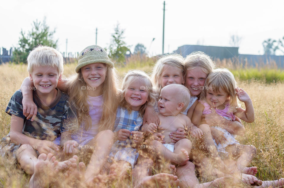 seven kids in different ages