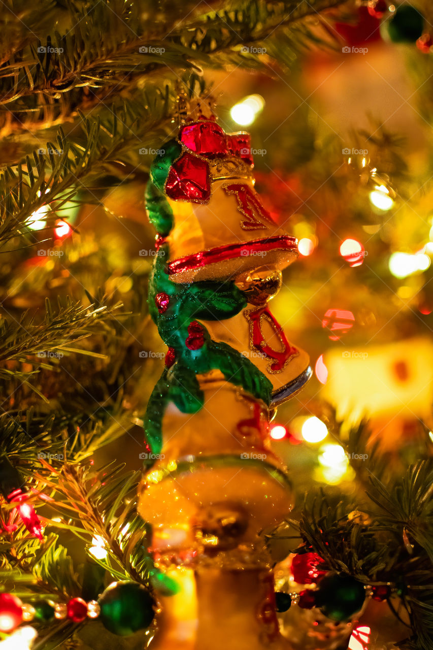 Christmas bells on christmas tree as a decoration.