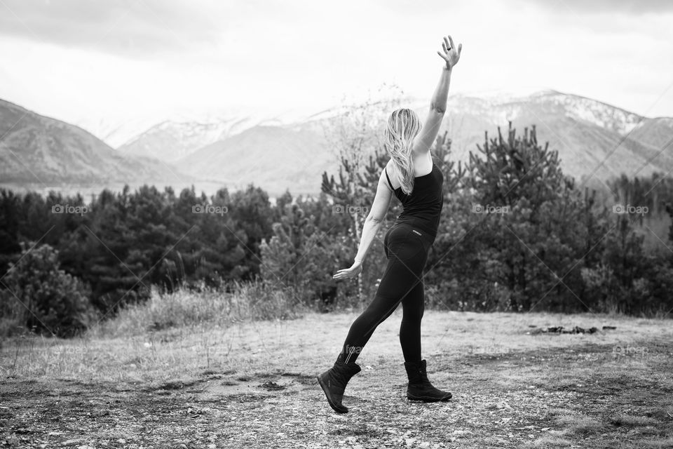 girl dancing on the mountain