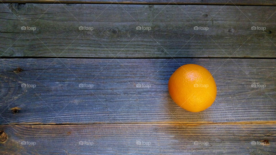 Orange on old boards