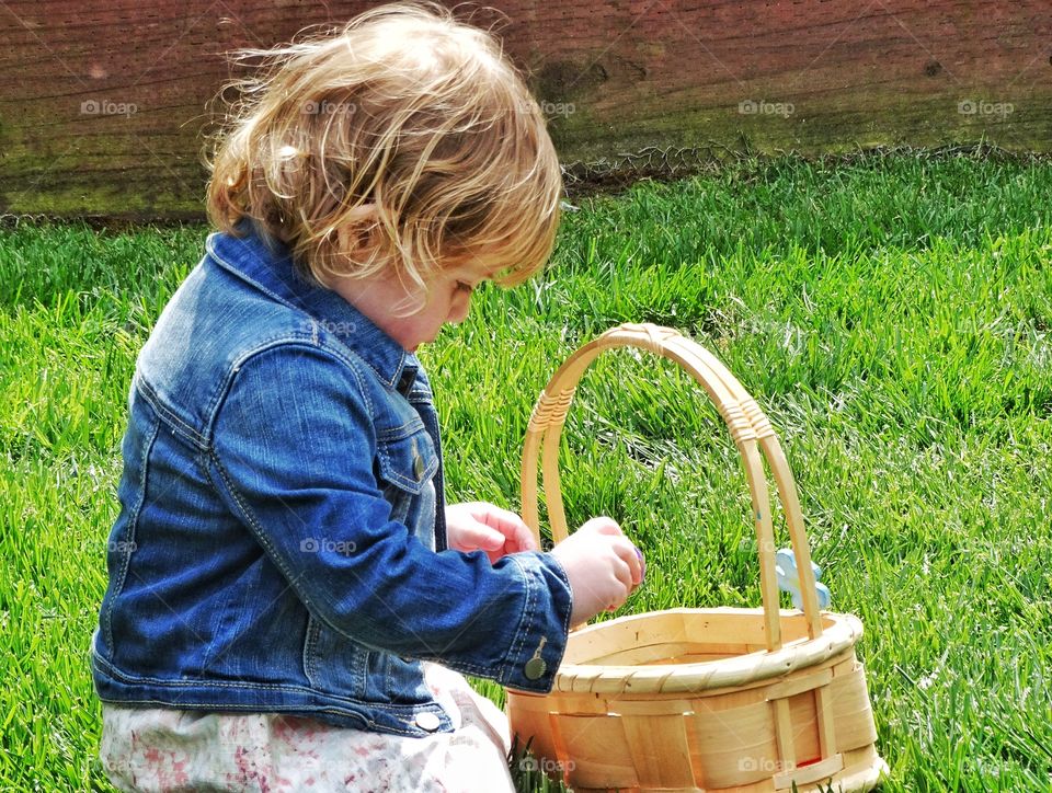 Girl With Easter Basket. Young Girl On An Easter Egg Hunt
