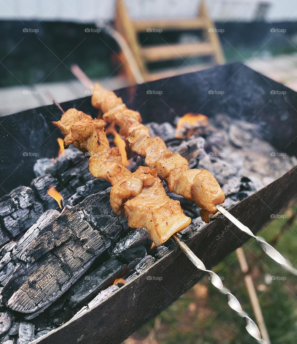 Cooking meat on the brazier