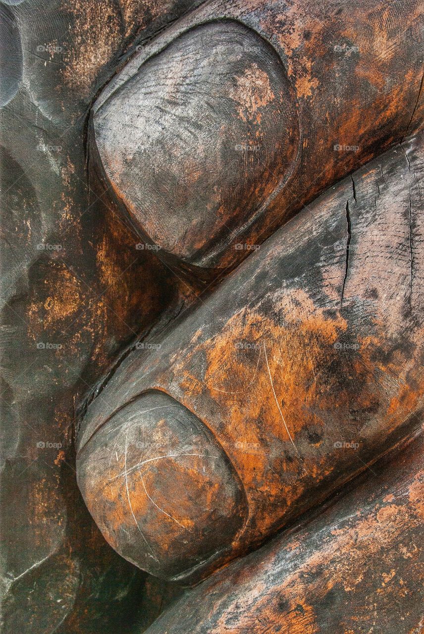 Abstracted from wood Carving of Giant Hand and Flint Tool
