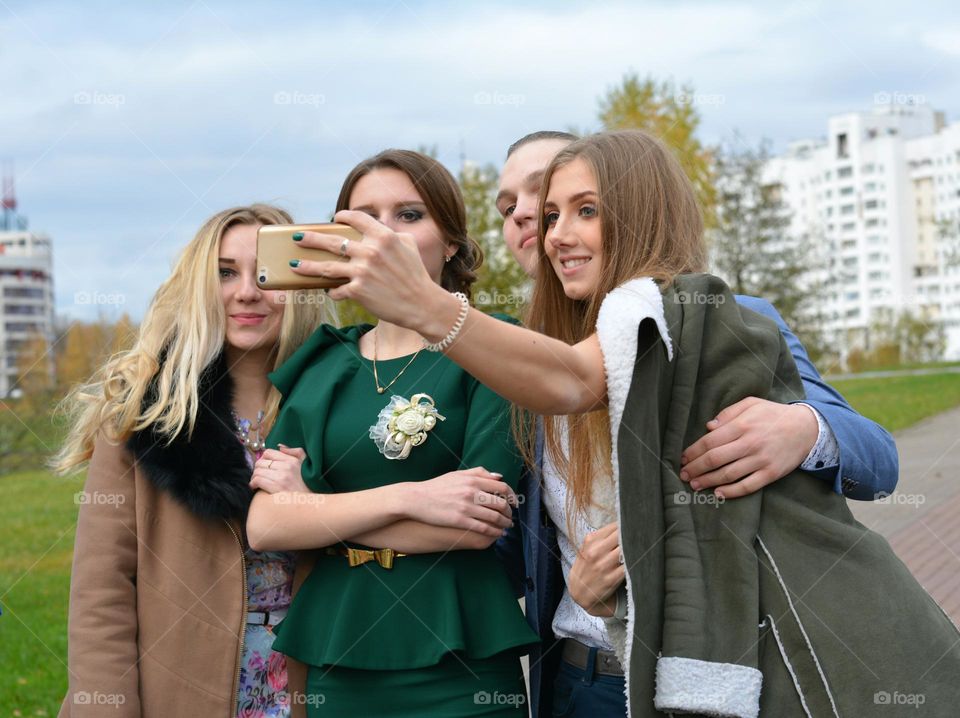 girls friends beautiful portraits, selfie outside